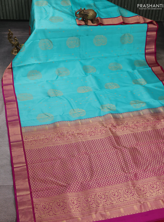 Pure kanchipuram silk saree teal blue and pink with allover zari woven buttas and zari woven korvai border