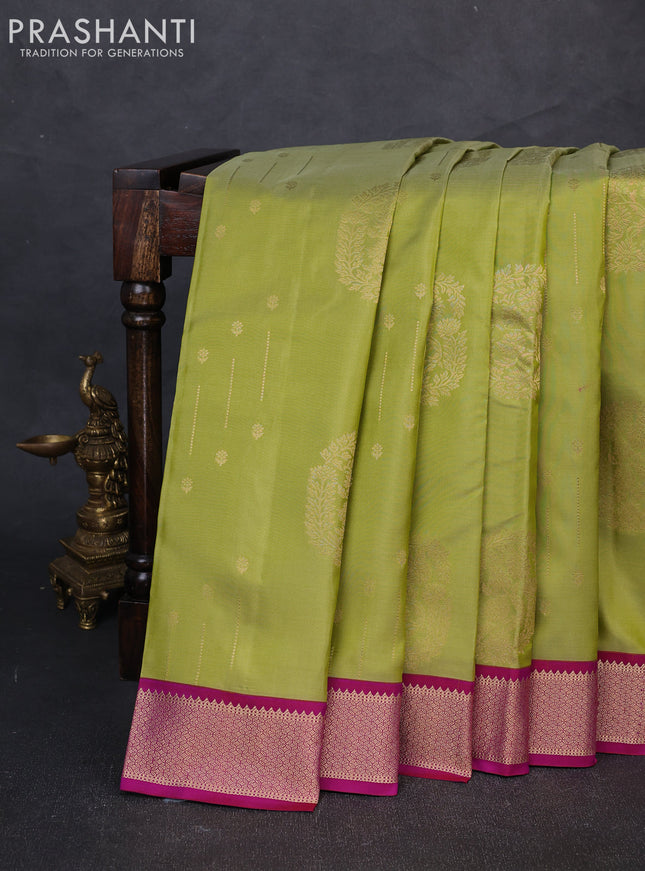 Pure kanchipuram silk saree pista green and pink with allover zari woven buttas and zari woven border