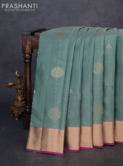 Pure kanchipuram silk saree pastel green and pink with allover zari woven buttas and zari woven border