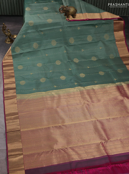 Pure kanchipuram silk saree pastel green and pink with allover zari woven buttas and zari woven border