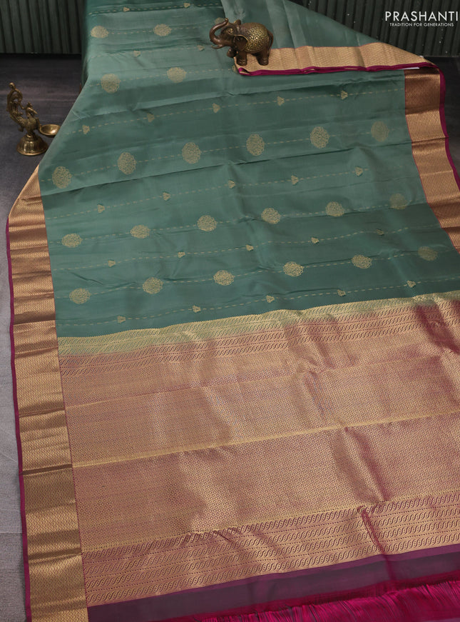 Pure kanchipuram silk saree pastel green and pink with allover zari woven buttas and zari woven border