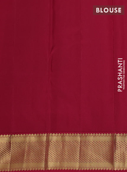Pure kanchipuram silk saree dual shade of teal green and maroon with allover zari woven buttas and zari woven korvai border