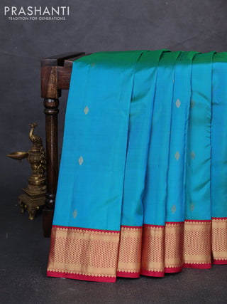Pure kanchipuram silk saree teal blue and maroon with allover zari woven buttas and zari woven korvai border