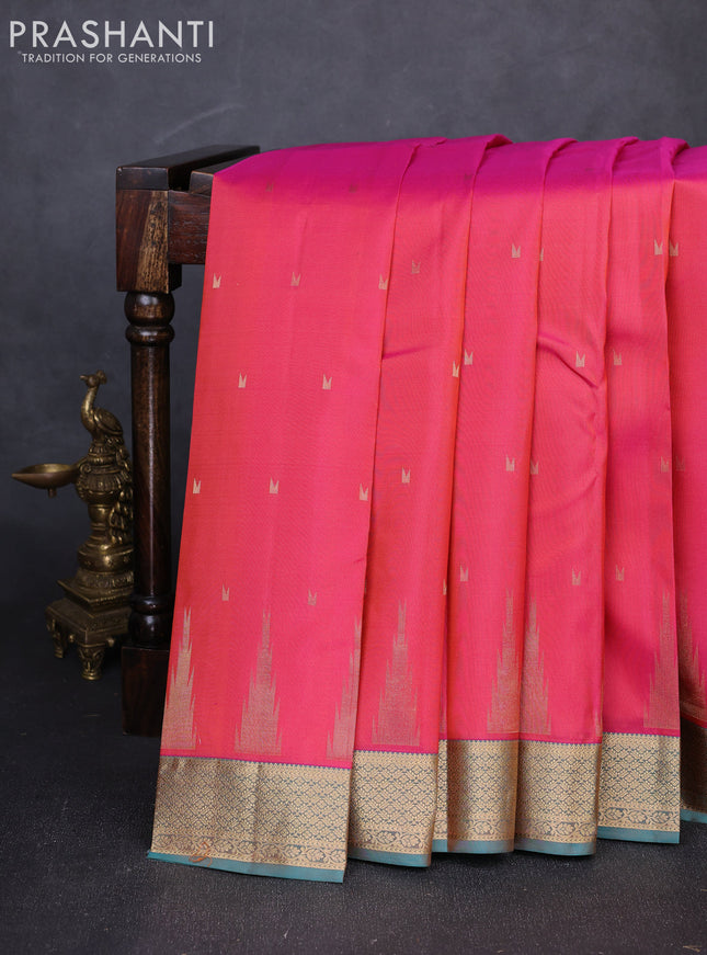 Pure kanchipuram silk saree tomato pink and teal green with allover temple zari woven buttas and zari woven border