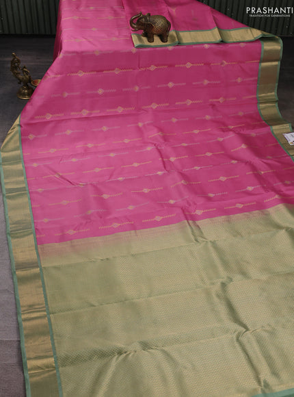 Pure kanchipuram silk saree peach pink and pastel green with allover silver& zari woven buttas and zari woven korvai border