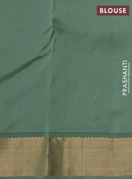Pure kanchipuram silk saree peach pink and pastel green with allover silver& zari woven buttas and zari woven korvai border