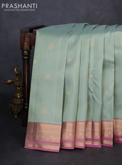Pure kanchipuram silk saree pastel green and pink with zari woven buttas and zari woven border