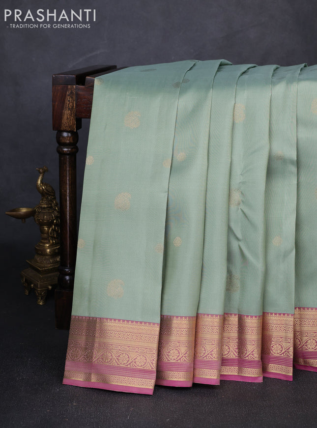 Pure kanchipuram silk saree pastel green and pink with zari woven buttas and zari woven border