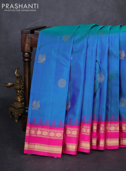 Pure kanchipuram silk saree dual shade of greenish blue and pink with zari woven buttas and temple design rettapet zari woven border