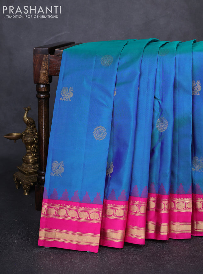 Pure kanchipuram silk saree dual shade of greenish blue and pink with zari woven buttas and temple design rettapet zari woven border