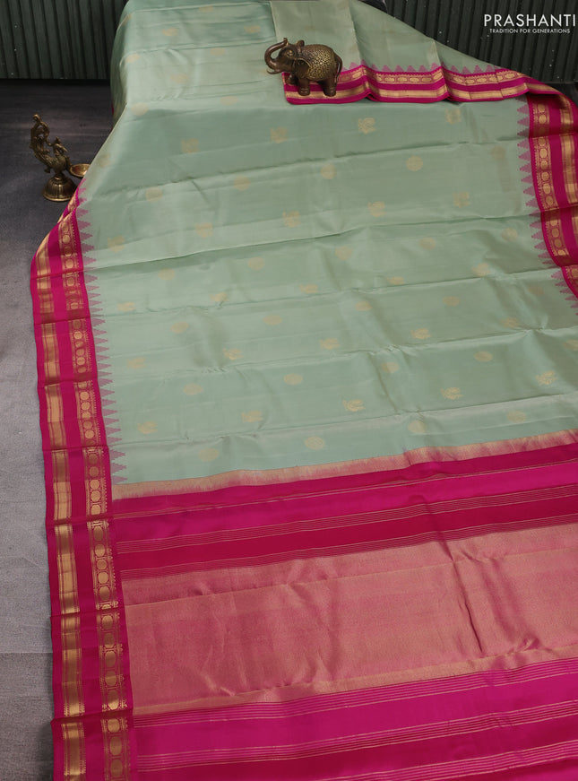 Pure kanchipuram silk saree pastel green and pink with zari woven buttas and temple design rettapet zari woven border