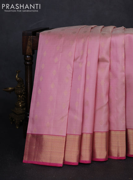 Pure kanchipuram silk saree pastel pink and pink with allover zari woven buttas and zari woven border