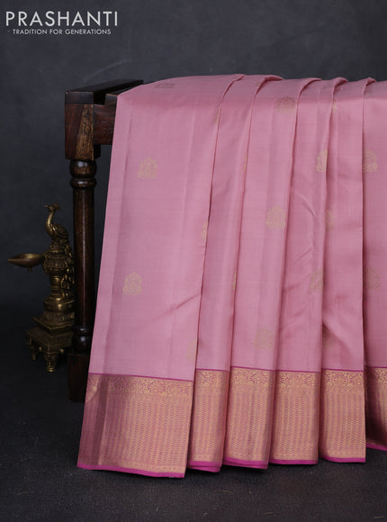 Pure kanchipuram silk saree peach pink and pink with allover zari woven buttas and zari woven border