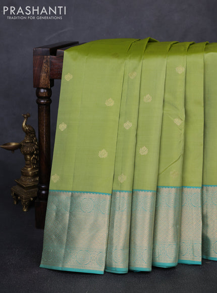 Pure kanchipuram silk saree pista green and teal green with allover zari woven buttas and long zari woven border