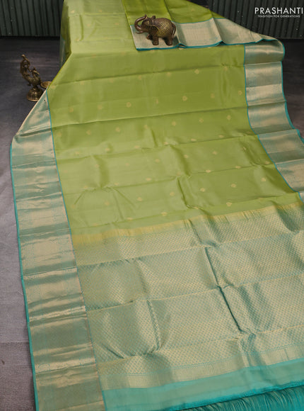 Pure kanchipuram silk saree pista green and teal green with allover zari woven buttas and long zari woven border