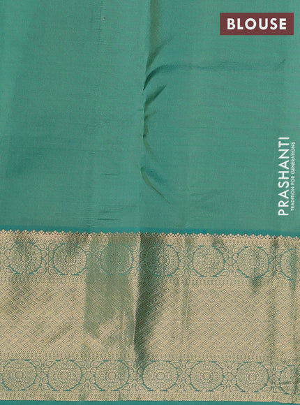 Pure kanchipuram silk saree pista green and teal green with allover zari woven buttas and long zari woven border