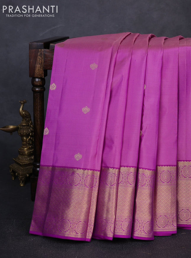 Pure kanchipuram silk saree purple with allover zari woven buttas and long zari woven border