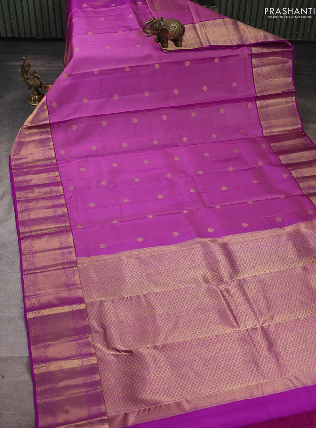 Pure kanchipuram silk saree purple with allover zari woven buttas and long zari woven border