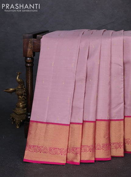 Pure kanchipuram silk saree pastel pink and pink with allover zari woven buttas and zari woven border