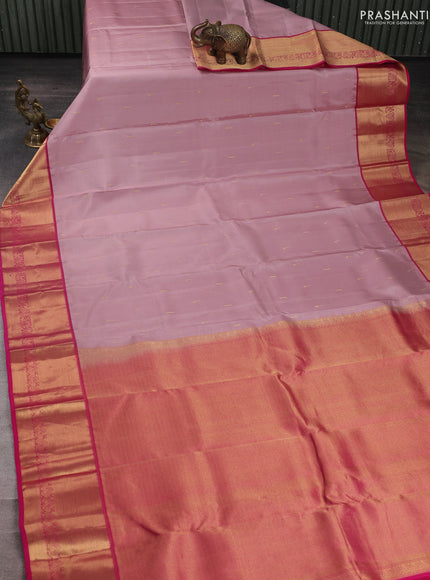 Pure kanchipuram silk saree pastel pink and pink with allover zari woven buttas and zari woven border