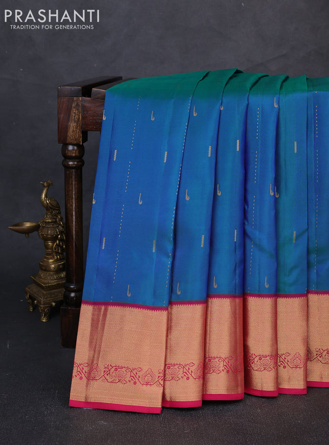 Pure kanchipuram silk saree dual shade of greenish blue and pink with allover zari woven buttas and zari woven border