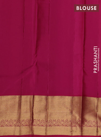 Pure kanchipuram silk saree dual shade of greenish blue and pink with allover zari woven buttas and zari woven border
