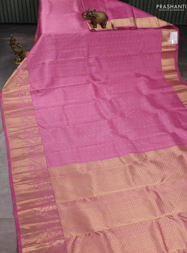 Pure kanchipuram silk saree peach pink with allover zari woven buttas and long zari woven border
