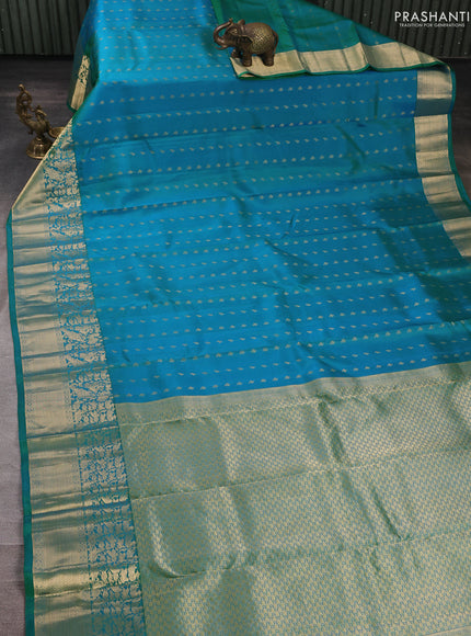 Pure kanchipuram silk saree dual shade of green with allover zari woven buttas and long zari woven border