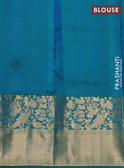 Pure kanchipuram silk saree dual shade of green with allover zari woven buttas and long zari woven border