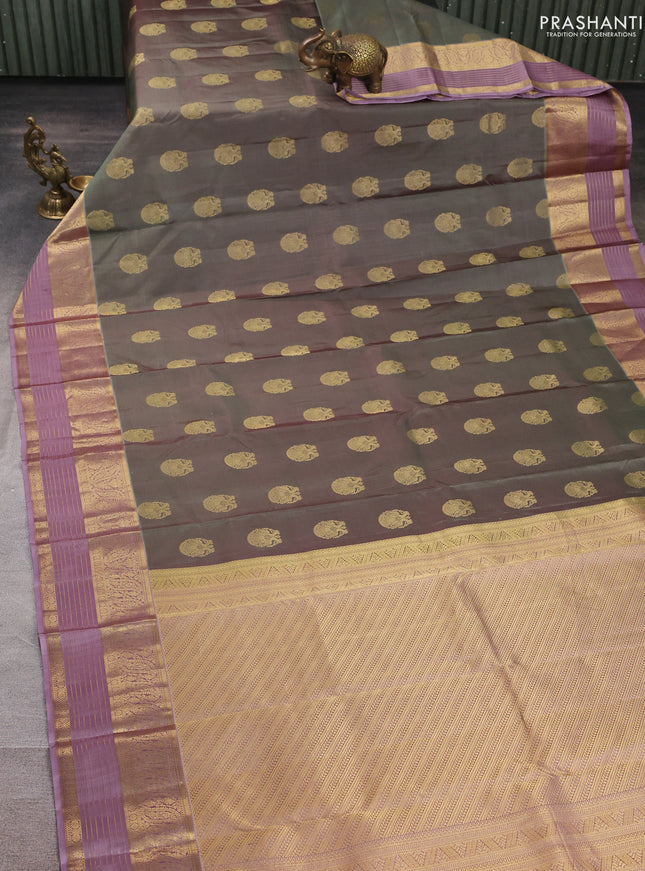 Pure kanchipuram silk saree pastel green and pastel purple with allover zari woven buttas and long zari woven border