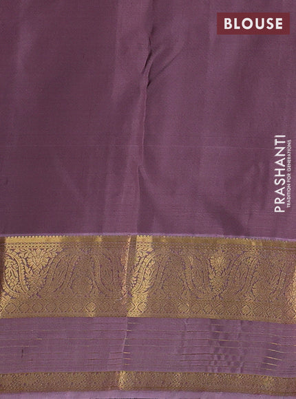 Pure kanchipuram silk saree pastel green and pastel purple with allover zari woven buttas and long zari woven border