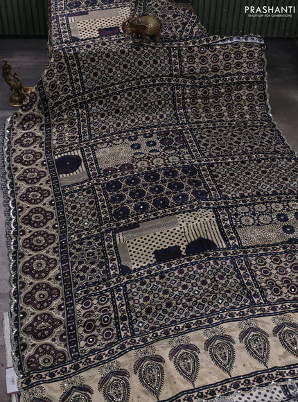 Crepe silk saree beige and wine shade navy blue with allover ajrakh prints & mirror work embroidery and mirror embroidery pallu