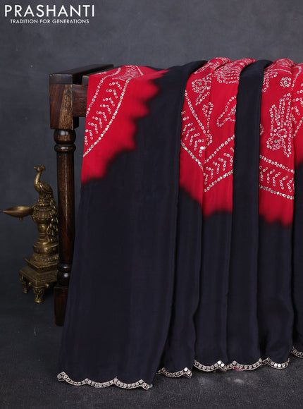 Crepe silk saree red and black with allover bandhani prints and mirror embroidery pallu