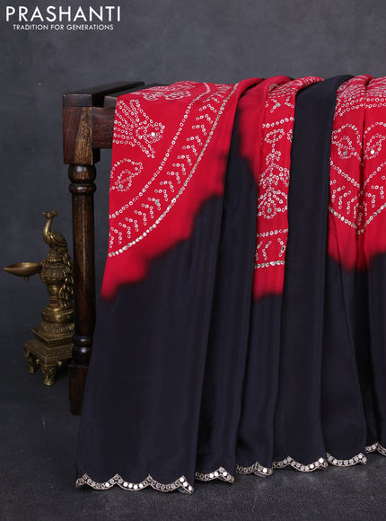Crepe silk saree red and black with allover bandhani prints and mirror embroidery pallu