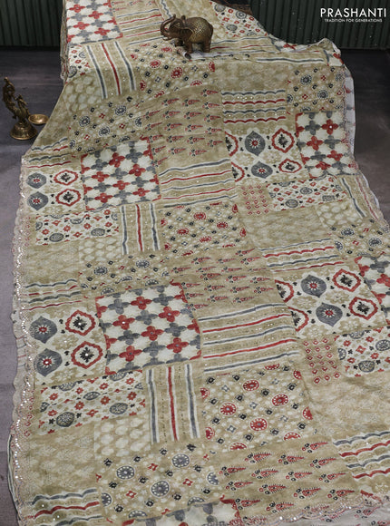 Crepe silk saree pastel green with allover ajrakh prints & mirror work embroidery and mirror embroidery pallu