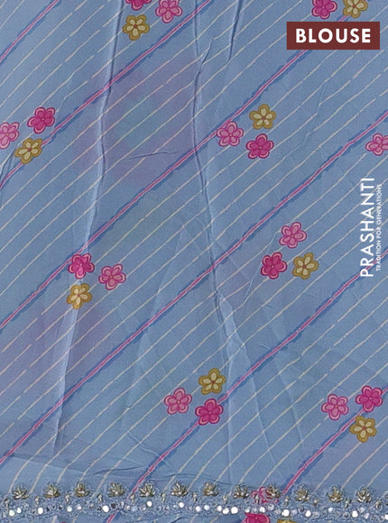 Crepe silk saree pastel blue with allover prints and sequin pallu