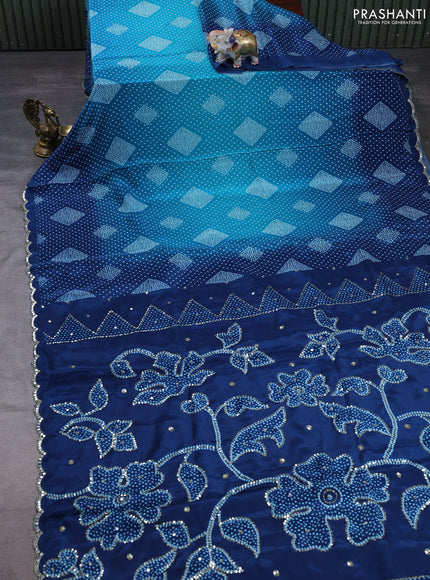 Crepe silk saree indigo blue with allover bandhani prints and mirror embroidery pallu