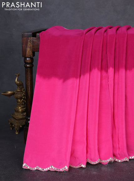 Crepe silk saree magenta pink and cream with plain body and printed mirror embroidery pallu