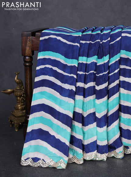 Crepe silk saree teal green and navy blue with allover zigzag prints and mirror embroidery pallu