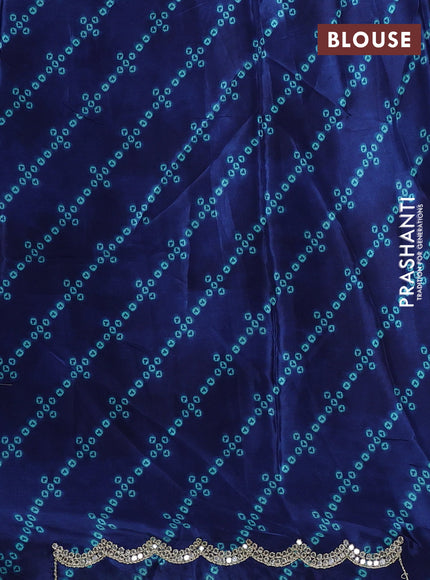 Crepe silk saree teal green and navy blue with allover zigzag prints and mirror embroidery pallu