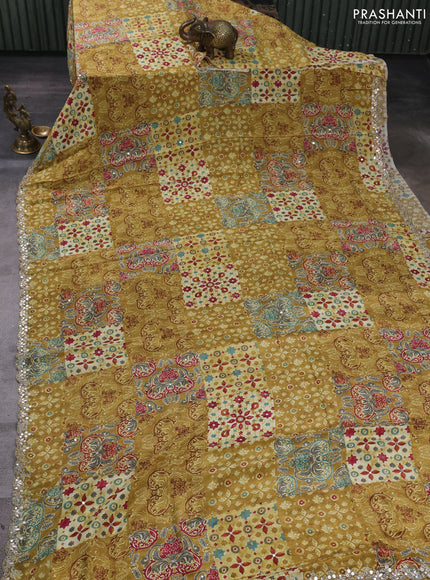 Crepe silk saree mustard yellow with allover ajrakh prints & mirror work embroidery and mirror embroidery pallu