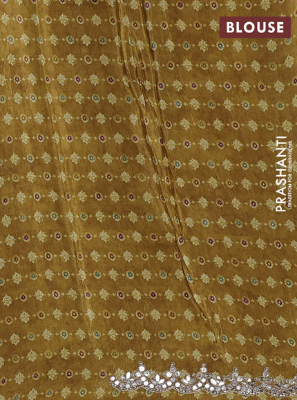 Crepe silk saree mustard yellow with allover ajrakh prints & mirror work embroidery and mirror embroidery pallu