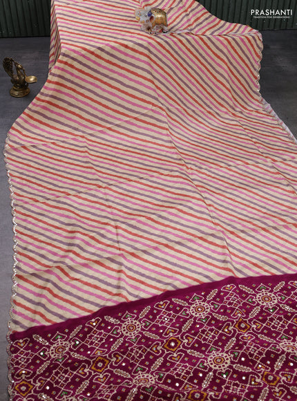 Crepe silk saree multi colour and dark magenta pink with allover leheriya pattern and ikat prints & mirror embroidery pallu