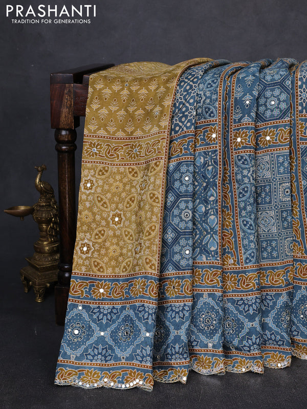 Crepe partly silk saree pastel blue and sandal with allover ajrakh prints & sequin work and mirror embroidery pallu