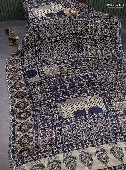 Crepe silk saree beige and blue rosy brown with allover ajrakh prints & sequin work and mirror embroidery pallu