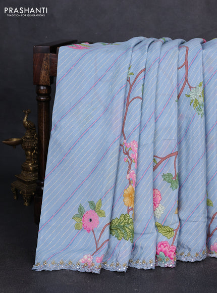Crepe silk saree pastel blue with allover prints and mirror sequin embroidery pallu