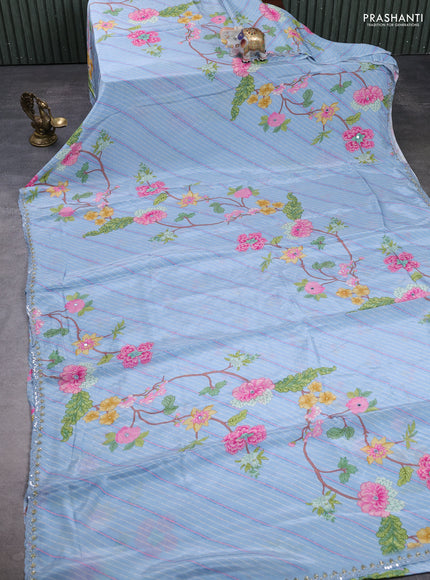 Crepe silk saree pastel blue with allover prints and mirror sequin embroidery pallu