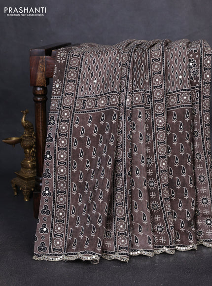 Crepe silk saree pastel brown with allover ajrakh prints & sequin work and mirror embroidery pallu