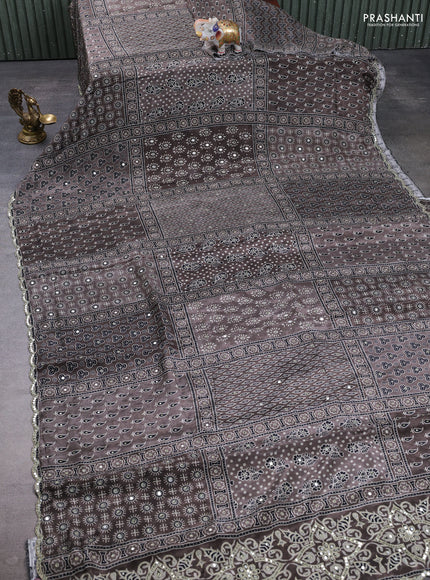 Crepe silk saree pastel brown with allover ajrakh prints & sequin work and mirror embroidery pallu