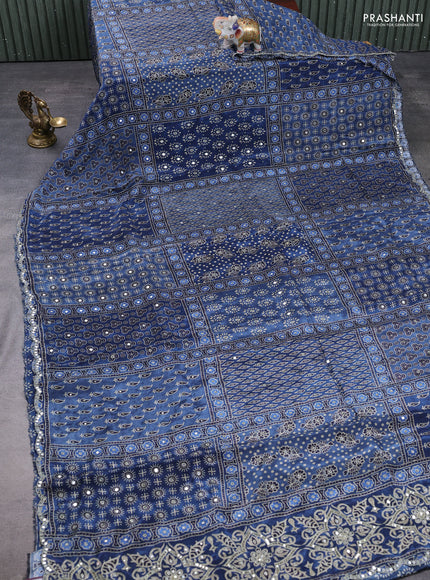 Crepe silk saree indigo blue with allover ajrakh prints & sequin work and mirror embroidery pallu